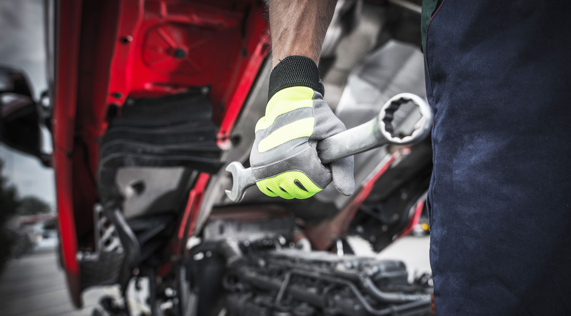 Mechanic holding wrench